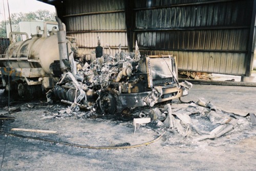 The remains of a tanker truck after an explosion ripped through an injection well site in a pasture outside of Rosharon, Texas, on Jan. 13, 2003, killing three workers. The fire occurred as two tanker trucks, including the one above, were unloading thousands of gallons of drilling wastewater. (Photo courtesy of the Chemical Safety Board)